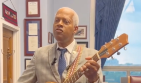 Screen Shot Of Rep. Hank Johnson Playing Guitar