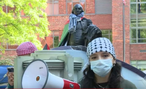 NextImg:Photo of GWU Protester’s ‘Final Solution’ Banner Goes Viral, Sparking Outrage