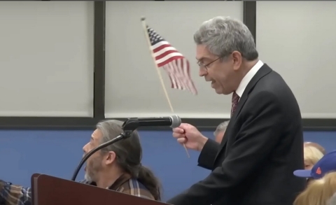 NextImg:Facing Potential Lawsuit, NJ Town Council Pres. Issues Obtuse ‘Apology’ after Ousting Man for Holding U.S. Flag
