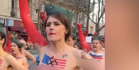 Topless Women with Swastikas and US Flags Painted on Their Chests Give Nazi Salute to Protest Trump