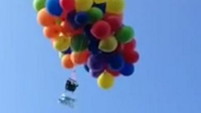 Video: Man Flies 9 Miles in Lawn Chair Tied to Balloons | MRCTV